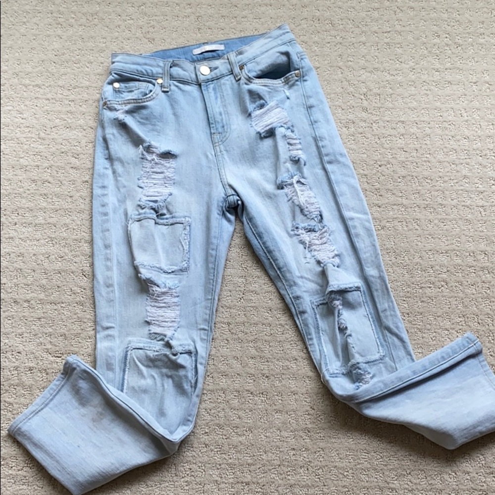 7 for all mankind light distressed jeans.